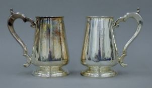 A pair of 925 silver tankards. 17.5 cm high. 677.9 grammes.