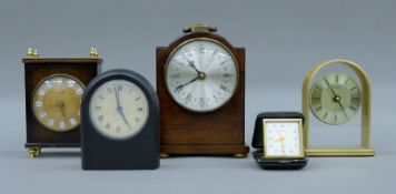 A 19th century mahogany mantle clock with later movement and four other clocks.