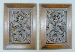 A pair of 19th century carved oak panels. 26.5 x 37 cm.