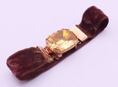 A Victorian unmarked gold and citrine mounted velvet bracelet. 17 cm long, Citrine 2 x 1.7 cm. 8.