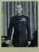 A photograph of The Late Prince Philip, signed to the margin and dated 1953, framed and glazed. 65.