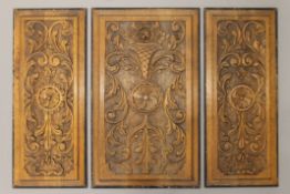 Three 19th century carved oak panels. The largest 48 x 79 cm.
