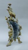 A gilt-heightened Black Forest carved wooden strutt mirror. 43 cm high.