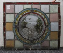 A stained leaded glass panel depicting a swan. 48 x 41 cm.