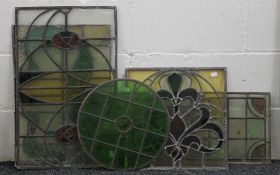 Five leaded stained glass panels. The largest 30 x 82 cm.