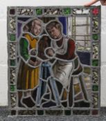 A stained leaded glass panel depicting potters. 53 x 53 cm.