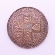 An 1847 Victoria silver Gothic Crown coin.