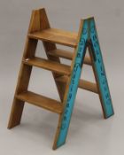 A 'Champagne' step ladder. 84 cm high.