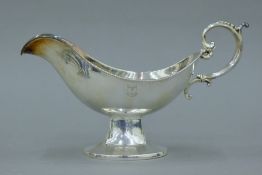 A 925 silver sauce boat. 23.5 cm long. 224.3 grammes.