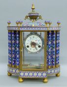 A cloisonne mantle clock. 46 cm high.