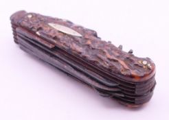 A Victorian antler-handled multi-blade pocket knife. 8.5 cm long closed.
