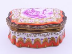 A 19th century Continental porcelain and gilt metal mounted snuff box,
