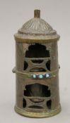 An antique Tibetan prayer wheel. 20 cm high.