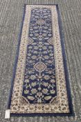 A small modern blue ground runner. 61 cm wide x 230 cm long.
