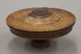 An oak roundel set with a copper medallion of Admiral Earl St Vincent. 15.5 cm diameter.