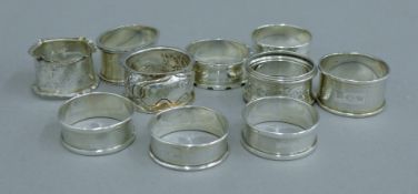 A quantity of silver napkin rings. The largest 2.5 cm high. 136 grammes.