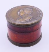 A Charles James Fox commemorative snuff box. 5 cm diameter.