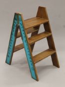 A set of 'champagne' step ladders. 86.5 cm high.