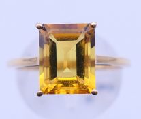 A 10 ct gold citrine ring. Ring size P/Q. 2.4 grammes total weight.