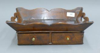 An 18th/19th century mahogany estate made butler's tray, fitted with a pair of drawers. 33.