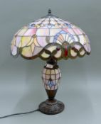 A Tiffany-style table lamp. 62 cm high.