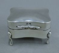 A small silver trinket box. 6 cm wide.