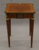 A late 19th/early 20th century French ormolu-mounted side table. 50.5 cm squared.