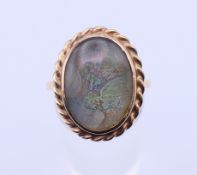 A 9 ct gold dress ring. Setting 2.2 x 1.7 cm, ring size N/O. 6.5 grammes total weight.