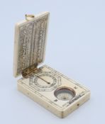 A bone compass. 9 x 6 x 1.8 cm.
