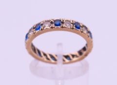 A 9 ct gold eternity ring. Ring size O. 2.8 grammes total weight.