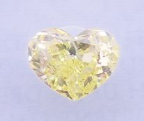 An encapsulated yellow heart shaped 0.