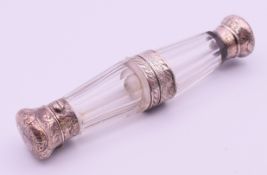 A Victorian unmarked silver mounted hinged double ended glass scent bottle. 13 cm high.