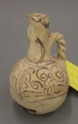 A pottery jug, possibly 6th - 8th century AD Mesopotamian,