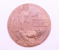 A WWI death plaque awarded to Edwin Sinclair Harvey in envelope card holder with King George V