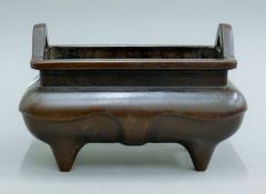 A Chinese rectangular bronze censer. 25 cm long.