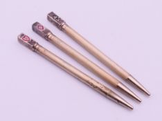 Three silver bridge pencils (Spades, Hearts and Diamonds). 8.7 cm high.
