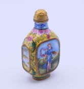 A Canton enamel snuff bottle and stopper. 7 cm high.