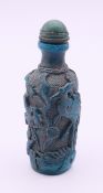 A Chinese snuff bottle and stopper. 8.5 cm high.