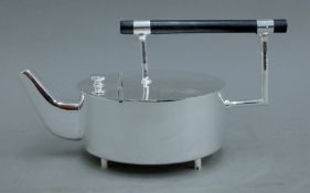 A Christopher Dresser-style teapot. 13 cm high.