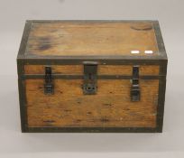 A small metal-bound wooden trunk. 48 cm wide.