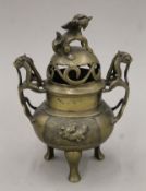 A 19th century Chinese bronze lidded censer. 25 cm high.