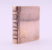 A Tiffany & Co sterling silver book form trinket box. 4.5 cm high. 43.7 grammes.