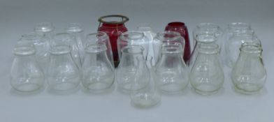 A collection of glass lamp shades, including two ruby glass examples. The latter each 16.5 cm high.