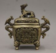 A late 19th century Chinese bronze lidded censer. 18 cm high.