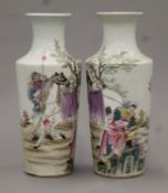 A pair of late 19th/early 20th century Chinese porcelain vases. 24 cm high.