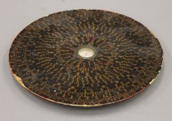 A Chinese lacquered geomancy (feng shui) compass. 22.5 cm diameter.