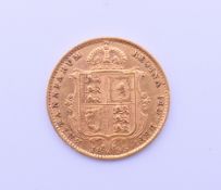 An 1893 gold half sovereign.