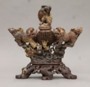 A Chinese soapstone censer carved with dogs-of-fo. 31.5 cm high.