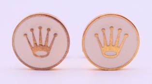 A boxed pair of Rolex cufflinks. 2 cm diameter.