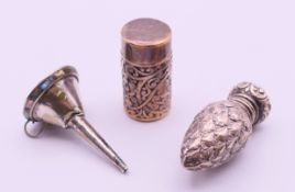 Two small silver scent bottles and a silver perfume funnel. Scent bottles 3.8 cm and 2.